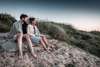 Couple enjoying the evening by the dunes near Vedersø Strand Camping.