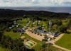 Dronebillede af Fur Camping med udsigt over pladsen og naturen ved Limfjorden.