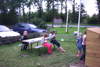 Children and adults enjoying rabbits at Skærbæk Camping.
