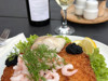 Stjerneskud – classic Danish fish dish with shrimp, fish fillet, and lemon served at Nissum Fjord Camping.